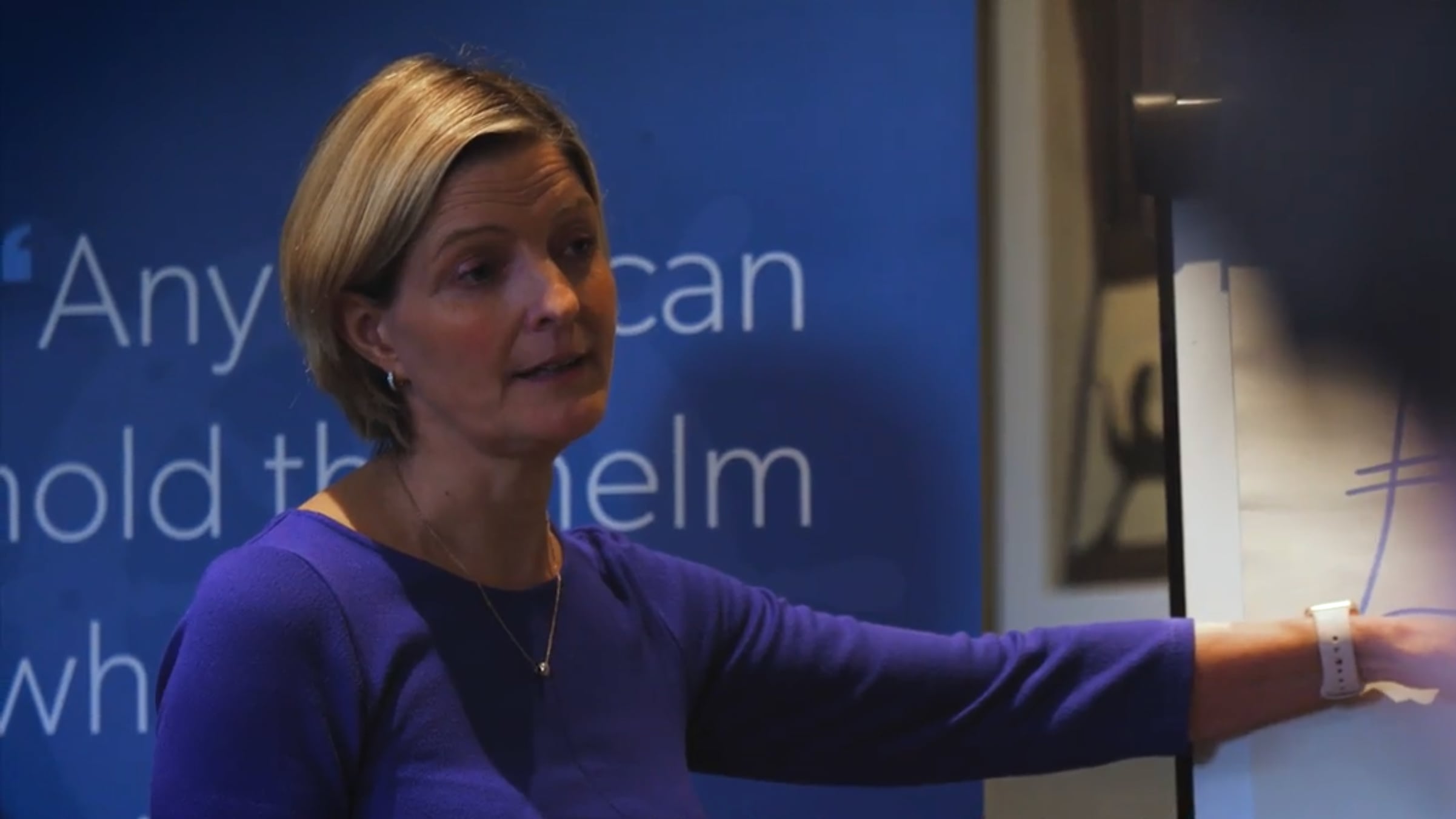 Laura Bouttell speaking at a Quarterdeck leadership seminar